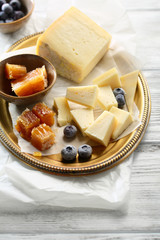Cheese with hineycomb and berry