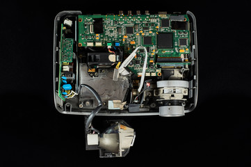 lamp and DLP projector on a black velvet background, flat lay
