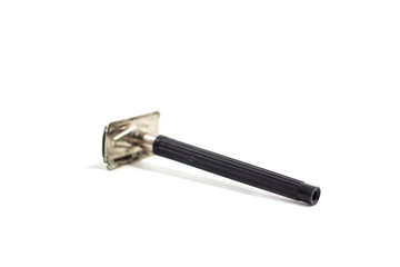 Used razor, white background, single blade