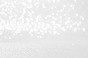 silver and white bokeh lights defocused. abstract background