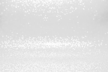 silver and white bokeh lights defocused. abstract background