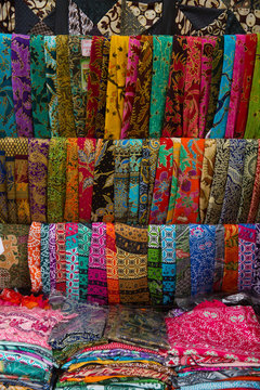 Stacks Of Colorful Fabrics And Textile. Fabric Pile