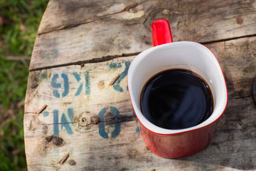 Red  Coffee cup in the garden