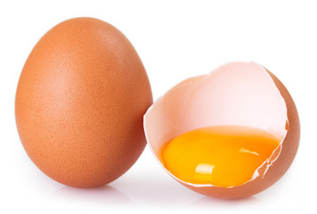 Raw eggs on white background