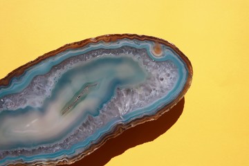 Aqua Blue Agate Crystal Quartz on Yellow Background