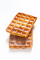Food concept Classic square Waffles with icing sugat toping on white background