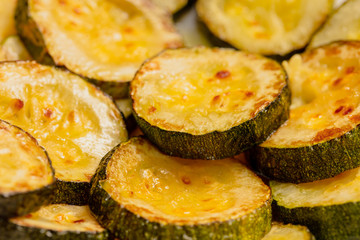 Fried in oil vegetable marrows in the kitchen