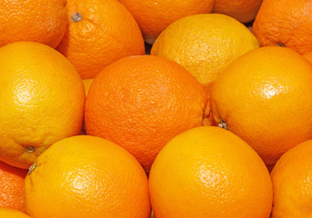 Obraz na płótnie Canvas close up of oranges on market