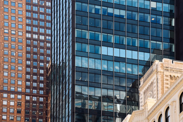 Fototapeta na wymiar Low angle view of skyscrapers in Midtown of Manhattan in New Yor