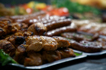 Street food on night outdoor market. Spicy, seafood, veggie, vegetable meal