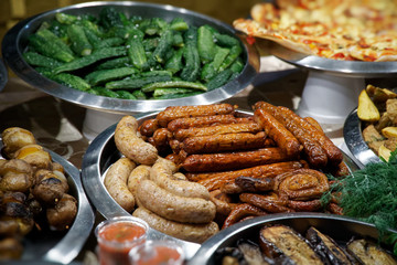 Street food on night outdoor market. Spicy, seafood, veggie, vegetable meal