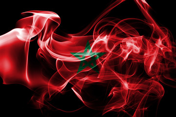 National flag of Morocco made from colored smoke isolated on black background