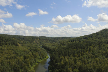 Fototapeta na wymiar River between mountains in summer