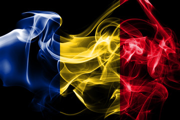 Fototapeta na wymiar National flag of Romania made from colored smoke isolated on black background