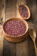 azuki beans , red beans on wood background

