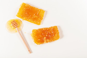 Fresh honeycombs on white background