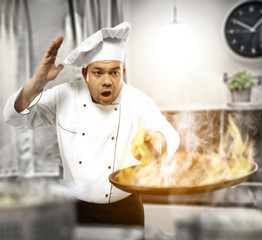 Cook chef in kitchen and free space for your decoration. 