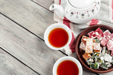 Turkish delight on a wooden table.