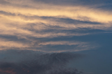 Dramatic sunset sky with colorful clouds after thunderstorm