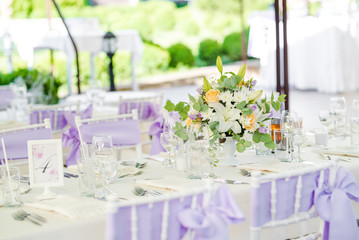 Wedding table set up. Outdoor set up of a wedding/party table with fresh flowers.