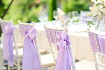 Chair decoration with a ribbon for a special event/wedding 