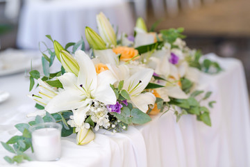Beautiful fresh flowers table decoration in a restaurant for a special event