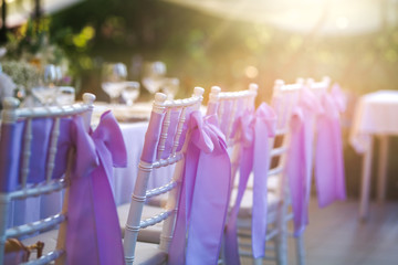Chair decoration with a ribbon for a special event/wedding 