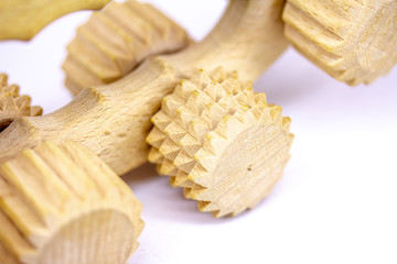 Wooden massager on wheels with spikes
