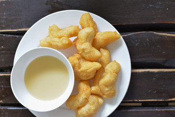 Deep-fried dough stick with milk