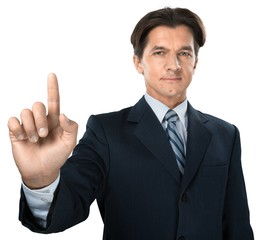 Portrait of young businessman in black suit isolated on white