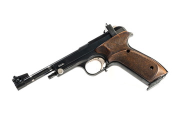 isolated used old sports pistol on a white background