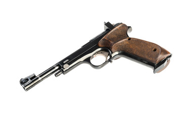 isolated used old sports pistol on a white background