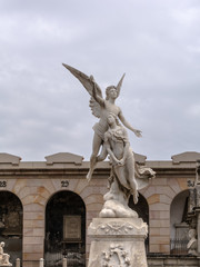 Barcelona, Spain - May 10, 2018: Neoclassic sculpture of a winged angel raising the swooning soul...