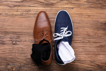 Elevated View Of Male's Formal And Sport Shoe