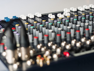 Audio mixer on white desk