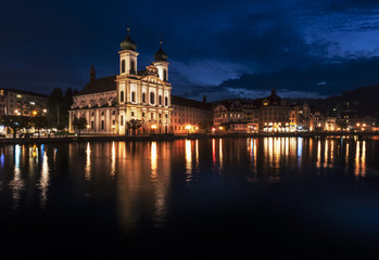 Fototapeta na wymiar Night view of Jesuitenkirche in Lake Lucerne, Vierwaldstättersee