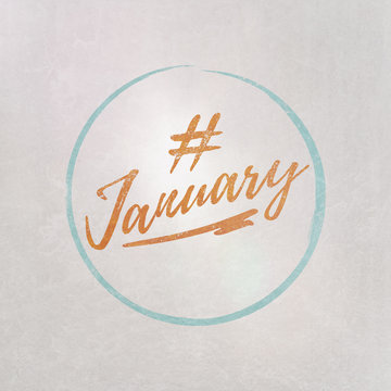 # Hashtag January written on textured grey background