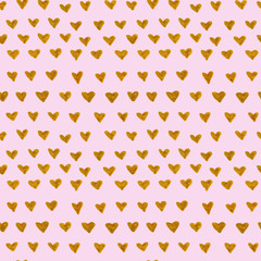 Hand Drawn golden hearts. Seamless pink pattern with gold hearts. Valentine's Day. Gift wrap, print, cloth, cute background for a card. Gold heart on pink background. 