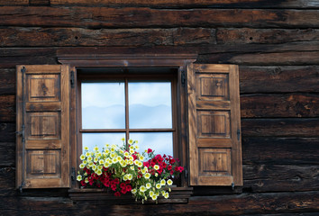 an old mountain house window