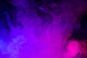 Colorful smoke close-up on a black background
