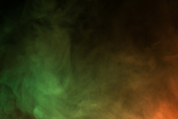 Colorful smoke close-up on a black background