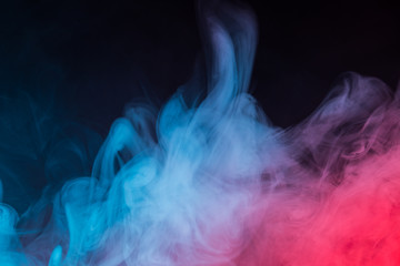 Colorful smoke close-up on a black background