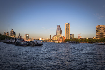 Fototapeta na wymiar London - August 05, 2018: Boats on the river Thames in the center of London, England