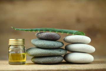 aloe oil spa therapy wood background