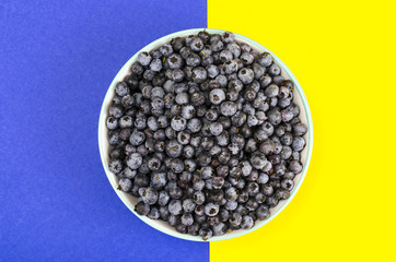 Lot of ripe blue blueberries in bowl