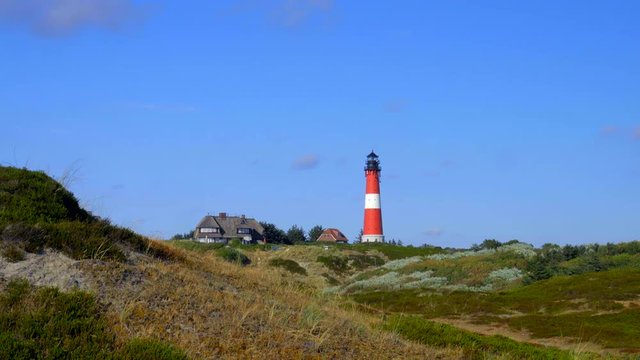 Leuchtturm Hörnum Sylt mit Dünen Landschaft  und Strand