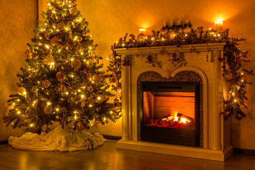 Happy new year and christmas. A cozy room where a fireplace burns and there is a Christmas tree...