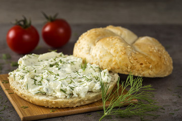 Slice of bread or bun with cream cheese