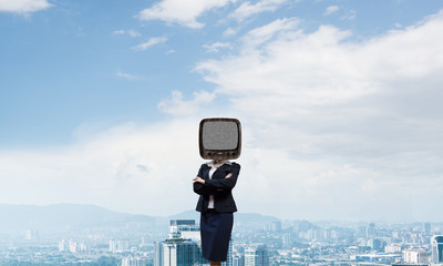Business woman with old TV instead of head.