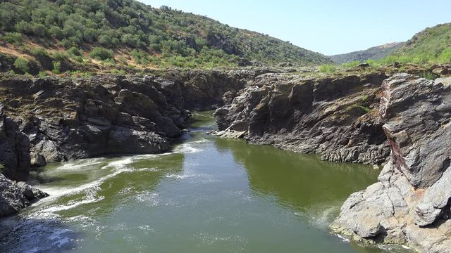 Pulo do Lobo or wolf's leap waterfall and cascade on river Guadiana, Alentejo, Portugal